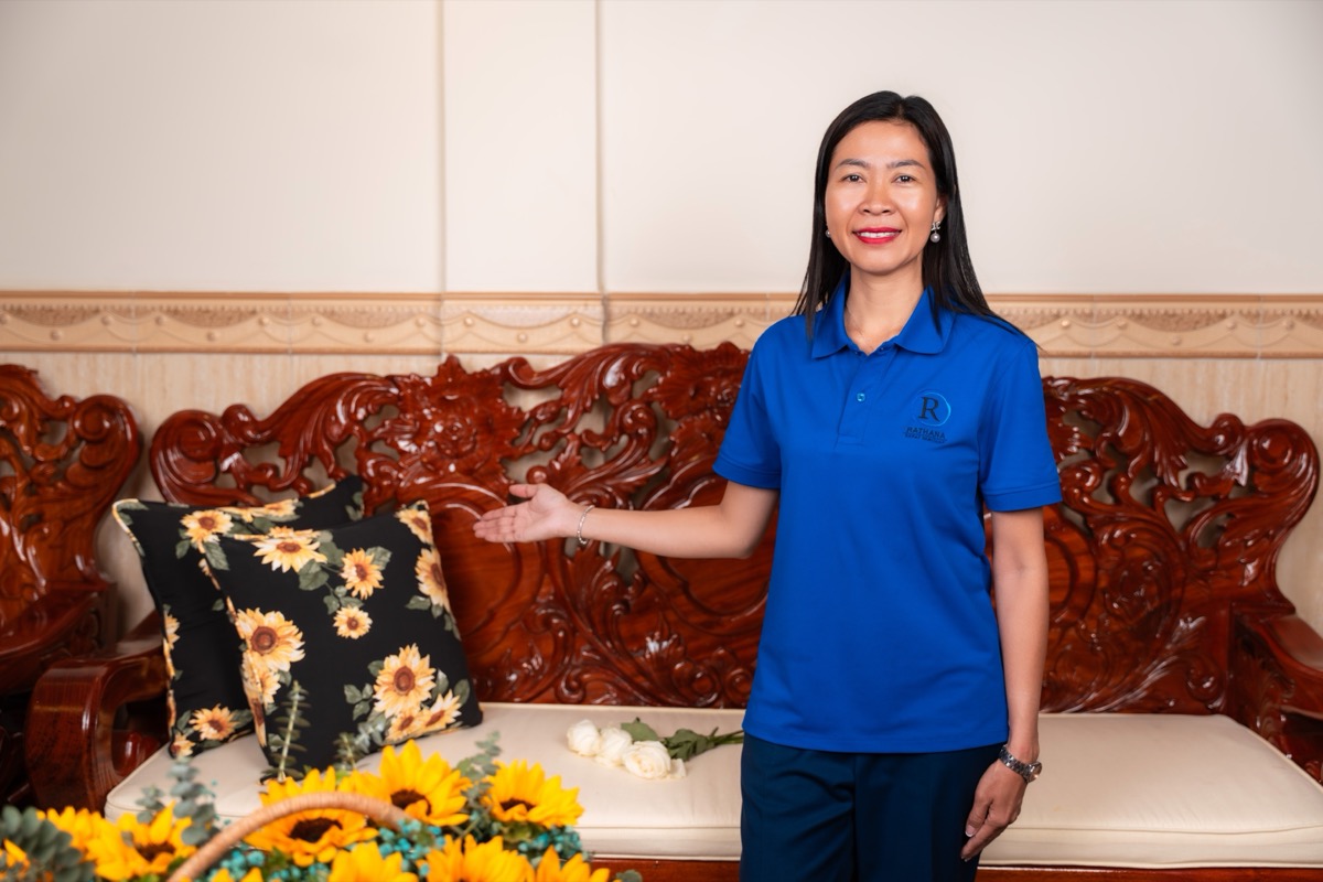 Artisan presenting sunflower cushions